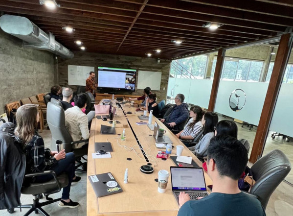 FBN employees gathered in the office for a meeting