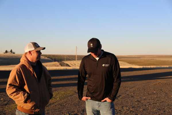 FBN Employee with Farmer in Field